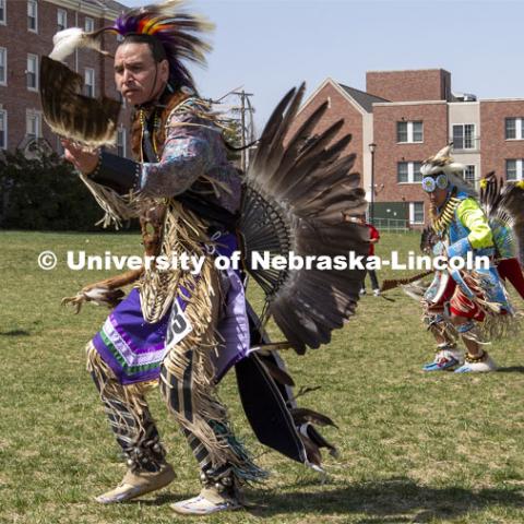 Maurice Phillips dances during the 2022 UNITE powwow. 2022 UNITE powwow to honor graduates (K through college). Held April 23 on the greenspace along 17th Street, immediately west of the Willa Cather Dining Center. This was UNITE’s first powwow in three years. The MC was Craig Cleveland Jr. Arena director was Mike Wolfe Sr. Host Northern Drum was Standing Horse. Host Southern Drum was Omaha White Tail. Head Woman Dancer was Kaira Wolfe. Head Man Dancer was Scott Aldrich. Special contest was a Potato Dance. April 23, 2023. Photo by Troy Fedderson / University Communication.